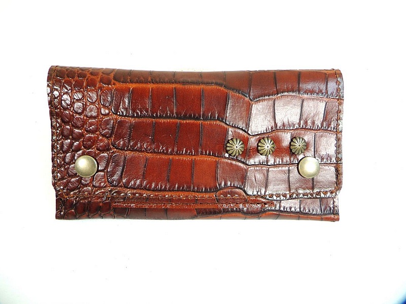 Sk&auml;mt om tobak med krokodiltryck