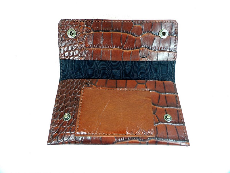 Sk&auml;mt om tobak med krokodiltryck